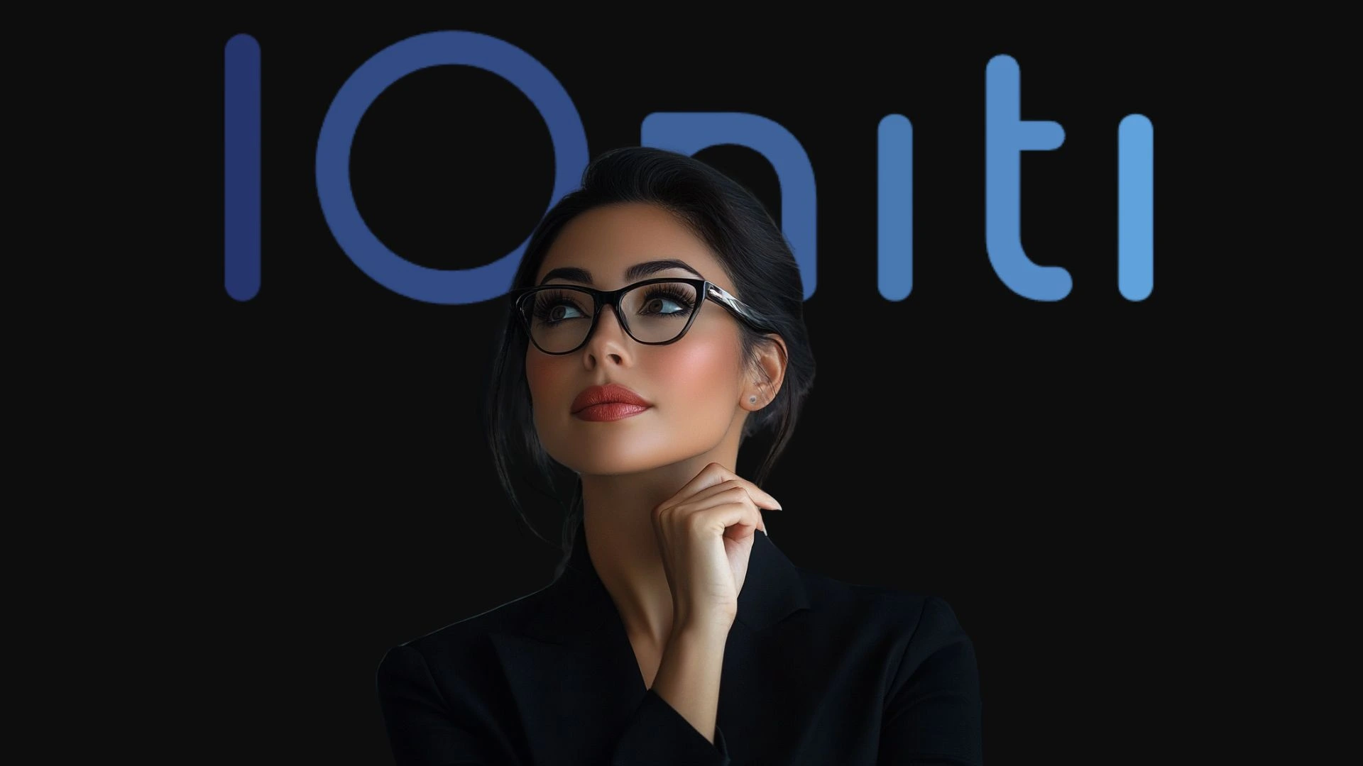 A thoughtful woman in front of the IQniti wordmark